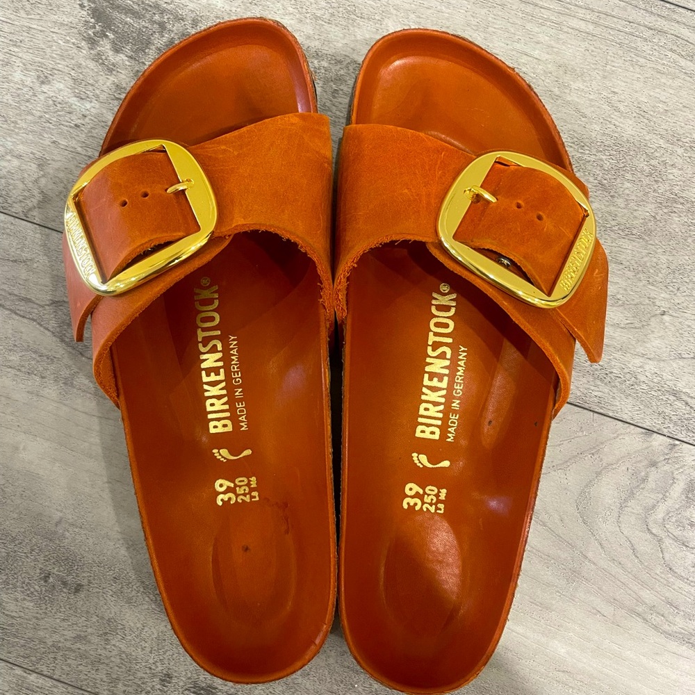 Birkenstock Orange Slide Sandals with Gold Buckle